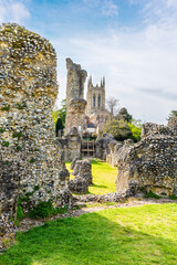 A view past the Abbey ruins and towards the cathedral at Bury Saint Edmunds on a bright day in springtime