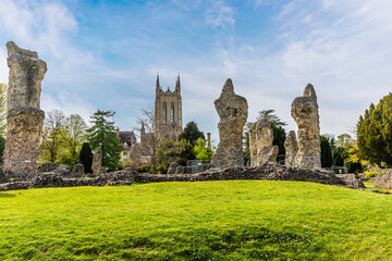 A view over the Abbey ruins and towards the cathedral at Bury Saint Edmunds on a bright day in springtime