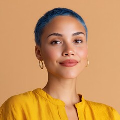 Woman smiles confidently with short blue hair and gold earrings. Self-confidence, beauty, diversity, positive attitude, style.