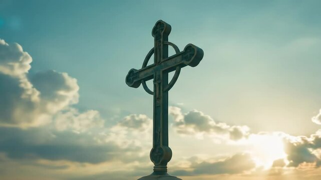 Majestic metal cross against sunrise sky inspirational image