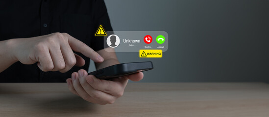 person holding mobile phone receiving incoming call from unknown number. Warning signs indicate potential phone scam, fraud or phishing attack. cybersecurity, call center, telecommunication concept