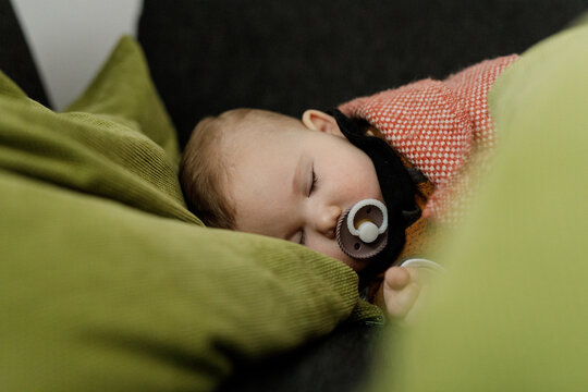 Adorable infant soundly asleep, a peaceful scene of childhood innocence.