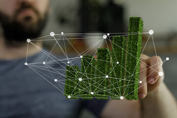 Eco-friendly business growth visualization.  Graph shows interconnected sustainable development.