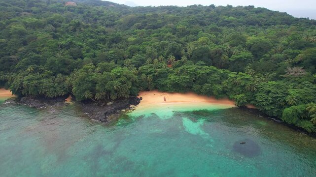 Aerial view from Margarida beach with turquoise sea and the beautiful green forest. Ilha do Principe (Prince Island) S&atilde;o Tom&eacute;,Africa