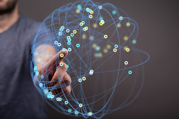 Hand interacting with a digital global network.  Technology, connection, and communication concepts.