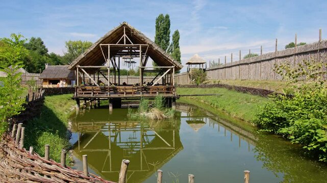 Viewing the traditional architecture and serene landscape of Keltsko selo on a sunny day