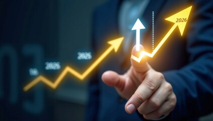 Businessman using his finger to touch 2026 a virtual screen displaying a financial growth graph, symbolizing success in business and technology