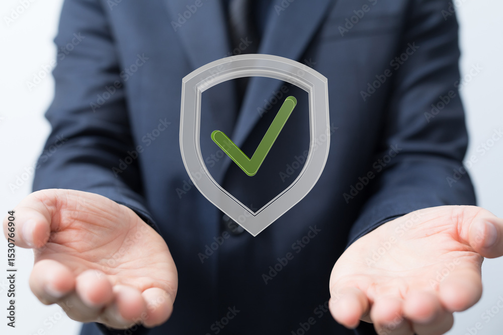 Poster image of a businessman holding a digital shield with a checkmark, symbolizing security and trust.
