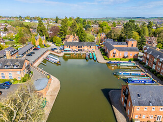 An aerial view from the canal towards the canal basin in the town of Market Harborough, UK on a bright day in springtime