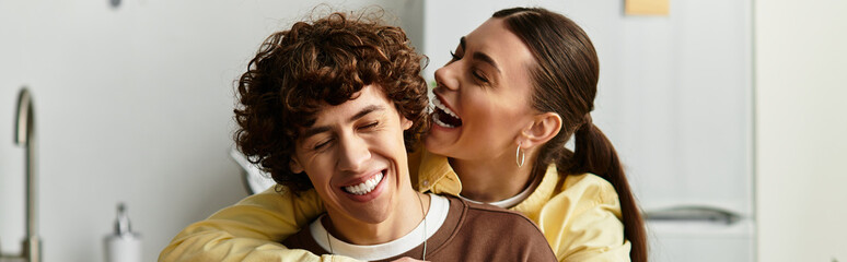 Cherished moments of a loving couple enjoying their time at home together in joy and laughter