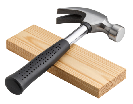 A claw hammer with a black rubber grip handle resting on a light wooden plank.