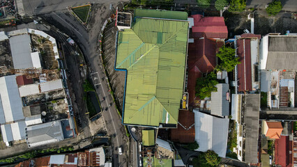 City Intersection and Surrounding Buildings in Indonesia. Aerial Perspective of Amidst City...