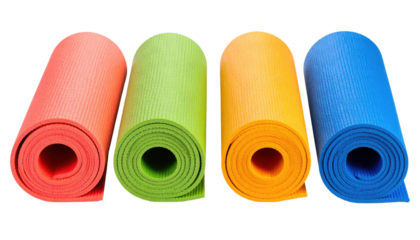 Four rolled yoga mats in red, green, yellow, and blue are neatly aligned side by side.