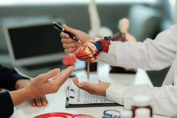 Patient with heart pain consulting a specialist to identify the cause and receive treatment...