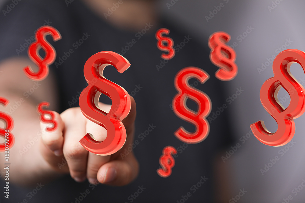 Poster abstract image of a hand interacting with floating 3d paragraph symbols, representing legal concepts