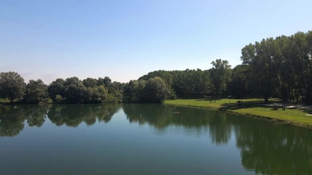 Exploring the serene beauty of Ivanovacka ada in Serbia surrounded by lush greenery and calm waters