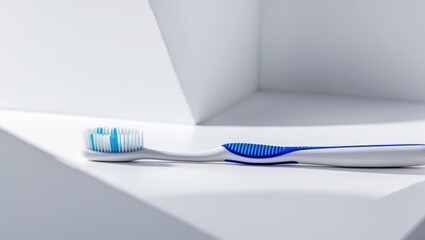 Blue plastic toothbrush on a white background.