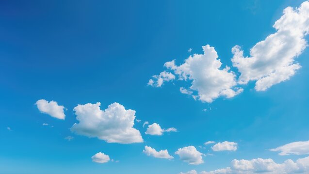 Fototapeta Blue clear sky with gentle white clouds. Highlights sustainability and spring for eco-conscious presentations.