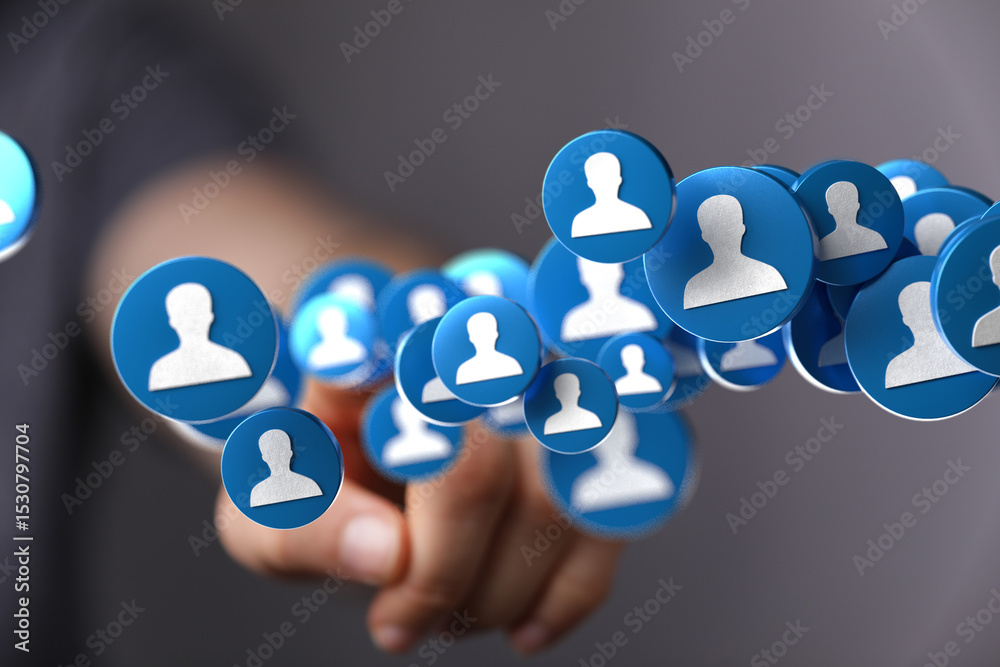 Poster Abstract image of a hand interacting with digital profile icons, symbolizing networking and social connections.