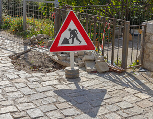 Pavement Street Reconstruction Road Work in Progress Traffic Sign Sunny Day