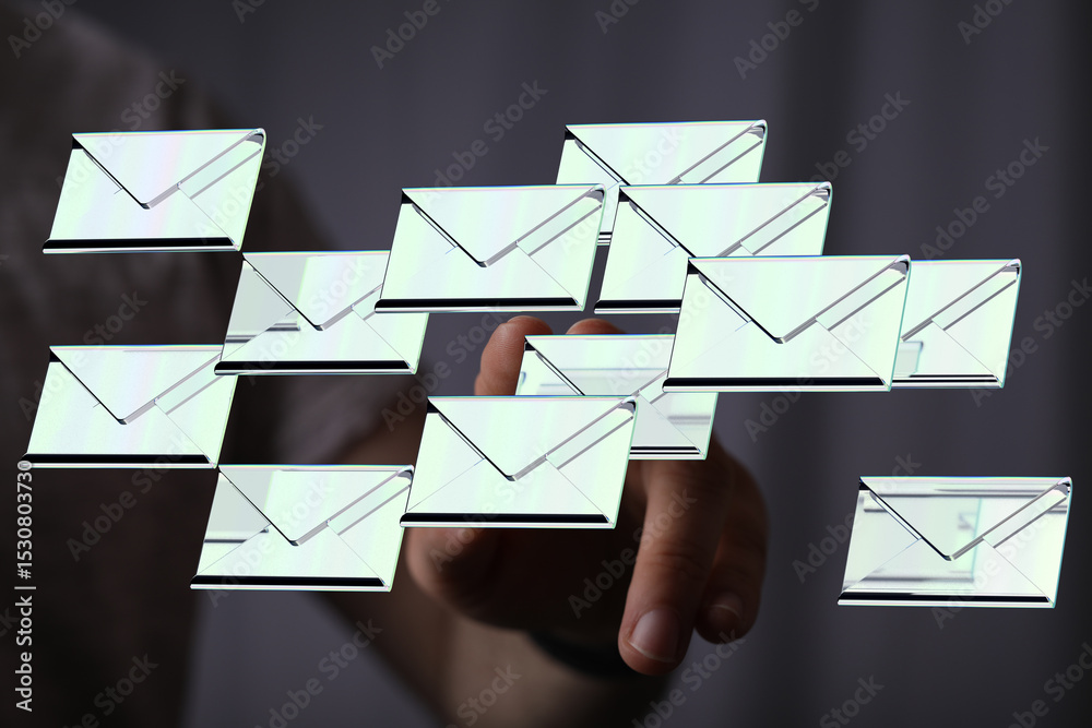 Aufkleber hand interacting with digital emails,concept of email overload, inbox management.