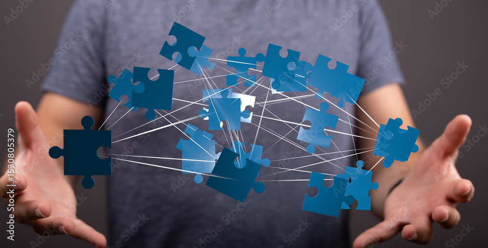 Aufkleber Abstract image of interconnected puzzle pieces, symbolizing teamwork, problem-solving, and collaboration.