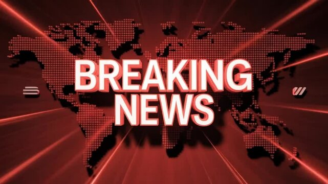 News studio with breaking news displayed on the background screen
