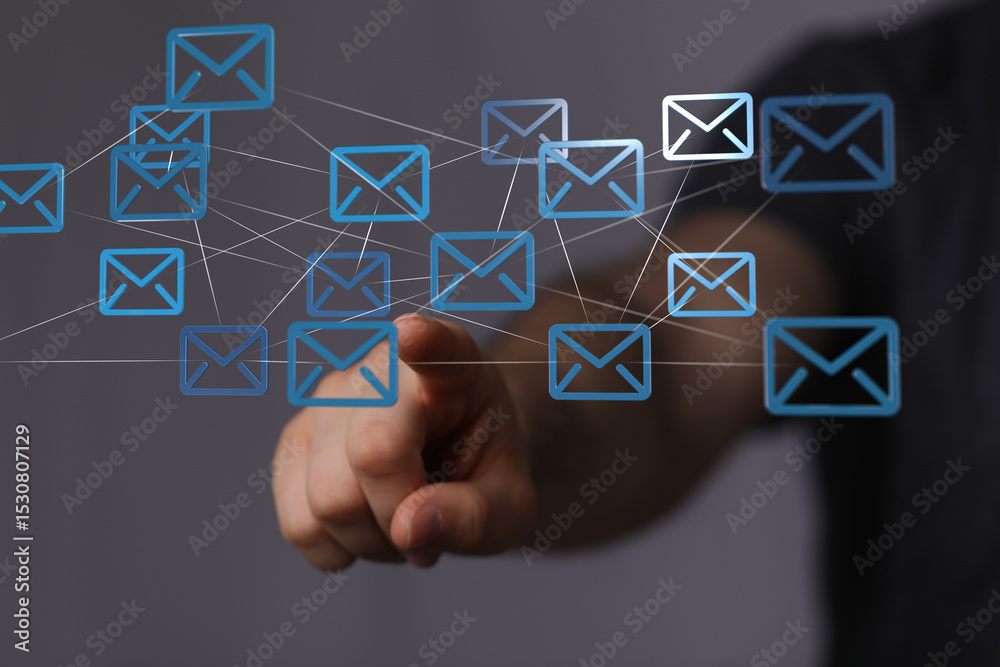 Poster Image depicts a hand interacting with a network of email icons, symbolizing global communication and interconnectedness.