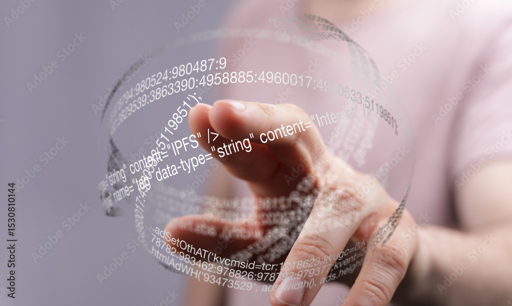 Fototapete Hand interacting with a transparent digital sphere showing data and code.