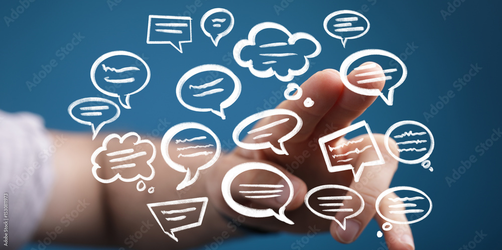 Poster abstract image of a hand interacting with digital speech bubbles, representing communication and ide