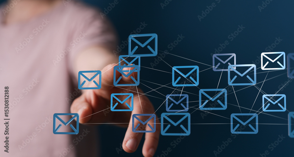 Aufkleber Hand interacting with digital email icons, representing global communication and networking.