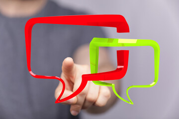 Hand pointing at 3D speech bubbles.  Great for communication, feedback, and conversation.