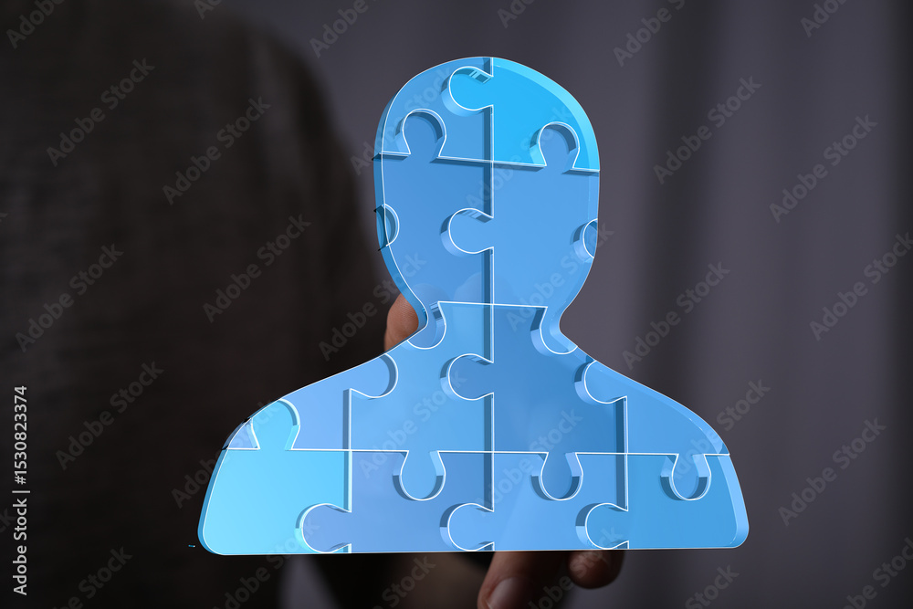 Aufkleber abstract image of a person made of puzzle pieces. represents teamwork, collaboration, and unity.