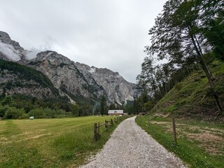 Panoramic view of Logarska dolina valley with peaks of Slovenian Alps covered by passing clouds. © Semi