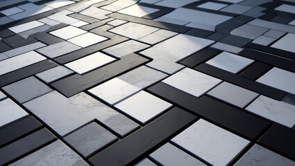 Black, white, and gray concrete tiles of various shapes in an outdoor pavement. Background and texture.