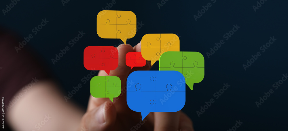 Aufkleber Colorful puzzle pieces forming speech bubbles, symbolizing communication and collaboration. Ideal for teamwork, problem-solving, and unity concepts.