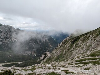 Panoramic view of Logarska dolina valley with peaks of Slovenian Alps covered by passing clouds. © Semi