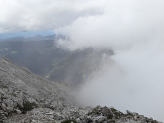Panoramic view of Logarska dolina valley with peaks of Slovenian Alps covered by passing clouds. © Semi