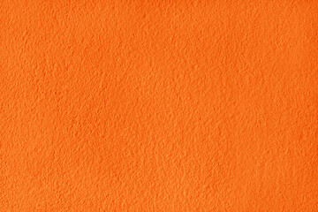 Orange and yellow color concrete wall texture for background and design.
