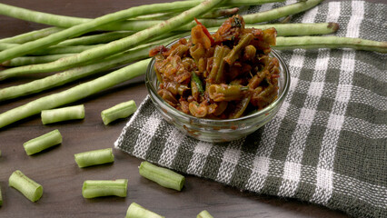 Fresh organic or French beans green peas on wooden background.Healthy food concept.