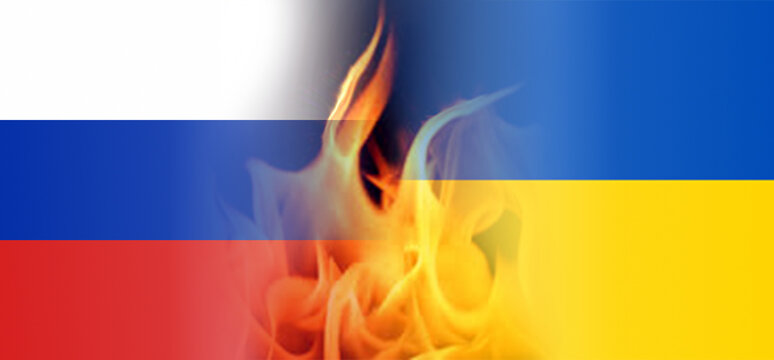 Conflict, war in Ukraine. Ukraine and Russian flags with flames between.