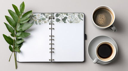 Planner with flexible schedule, coffee cups, and greenery create serene workspace