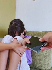 mom prohibiting teenage daughter to use cellphone