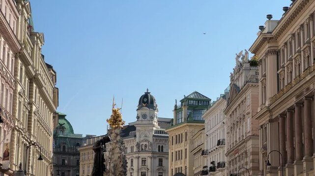 Building facades and Plague Column on Graben street, Vienna, Austria