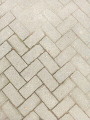 Gray Brick Paving Pattern in Outdoor Walkway or Patio