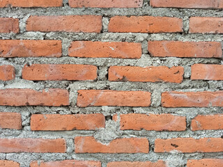 Red Brick Wall with Gray Mortar in Exterior Setting