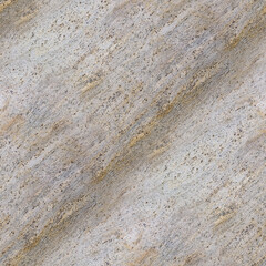 A coarse stone surface with gray, beige, and brown speckles, natural granularity and rugged texture.