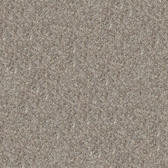 A coarse granite surface with speckled gray, beige, and black patterns, rugged natural texture and depth.