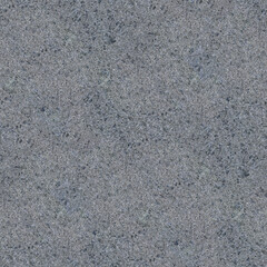A grainy pattern of multicolored noise, resembling static with speckled shades of gray, white, and brown.