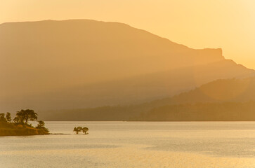 Serene landscape at dusk with a lake at Bhandardara also known as Wilson Dam, Maharashtra, India.